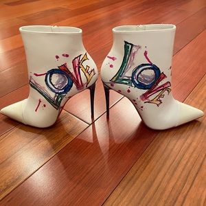 NEW! Christian Louboutin white booties.